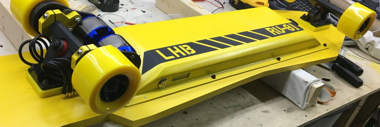 Yellow custom built electric skateboard